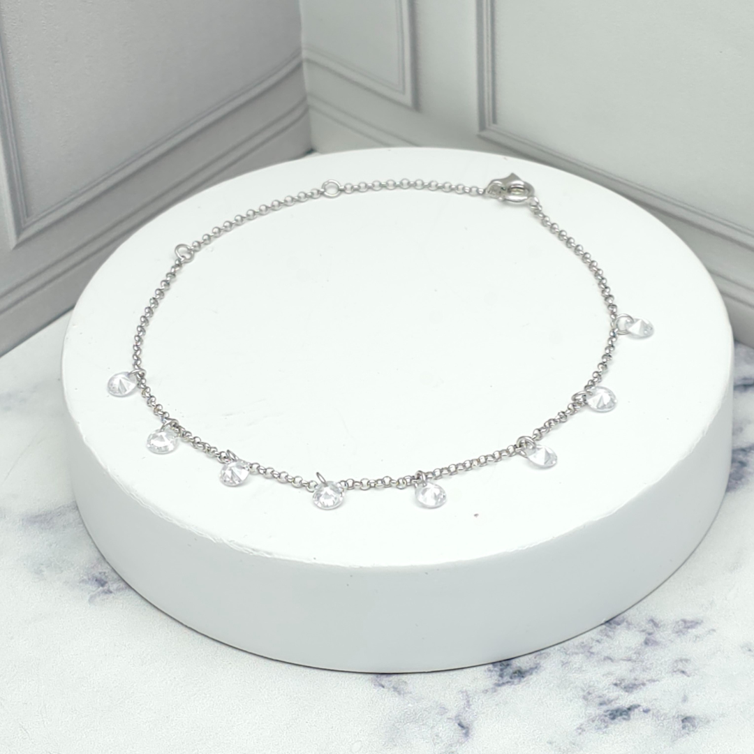 Pulsera de plata con dijes brillantes