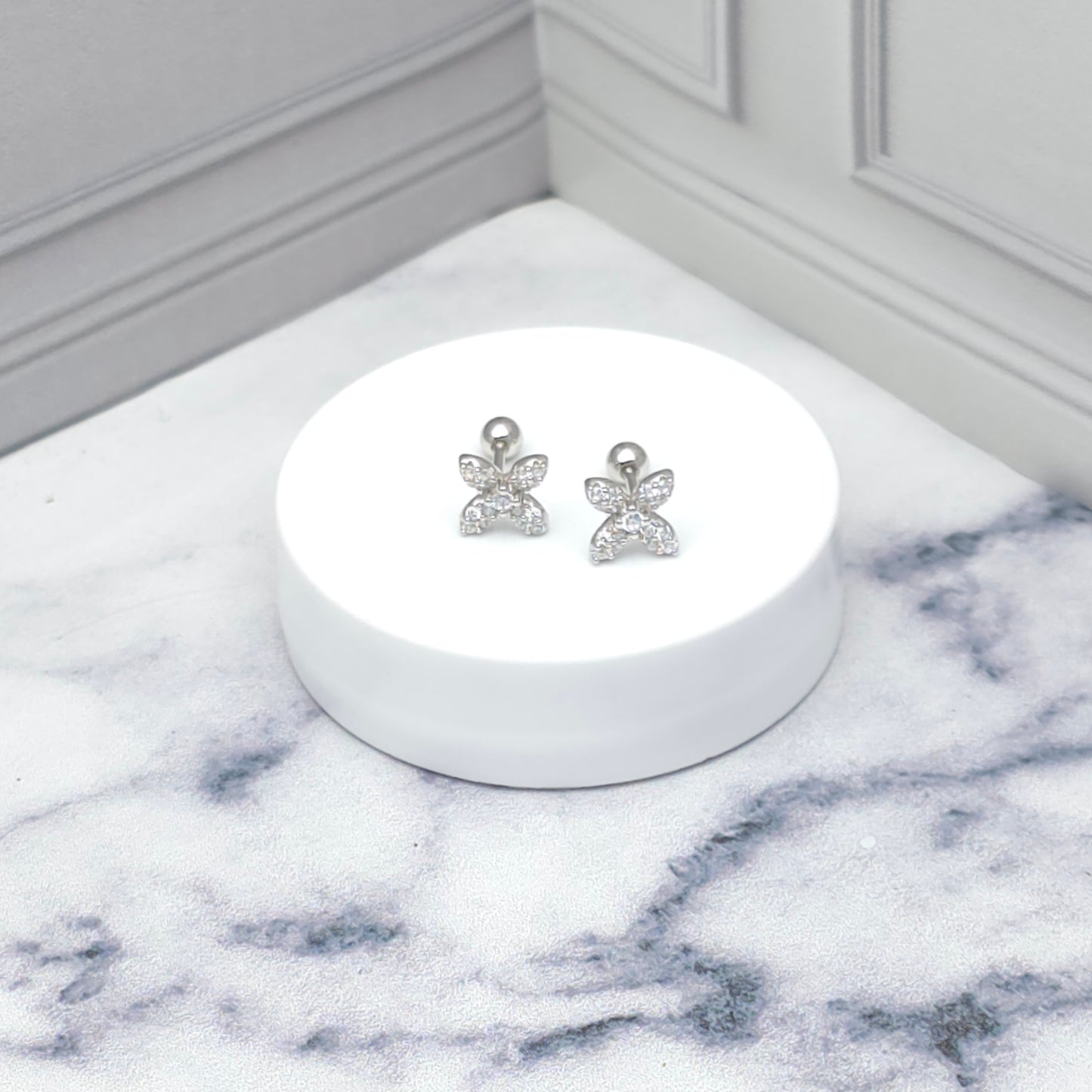 Aretes de plata flor con circonias