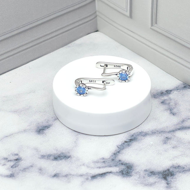 Aretes de plata con detalle azul