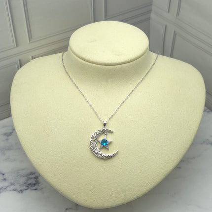 Collar de plata con luna y estrella azul