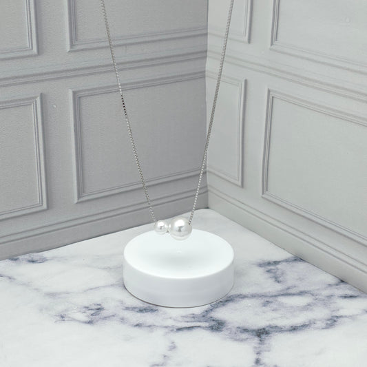 Collar de plata con doble perla