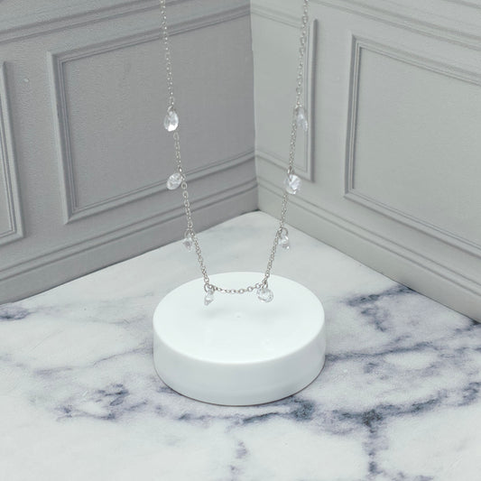 Collar de plata con dijes de circonia