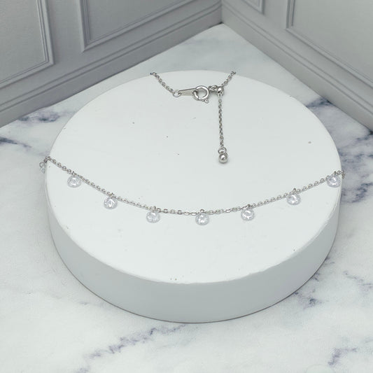 Collar de plata con dijes de circonia