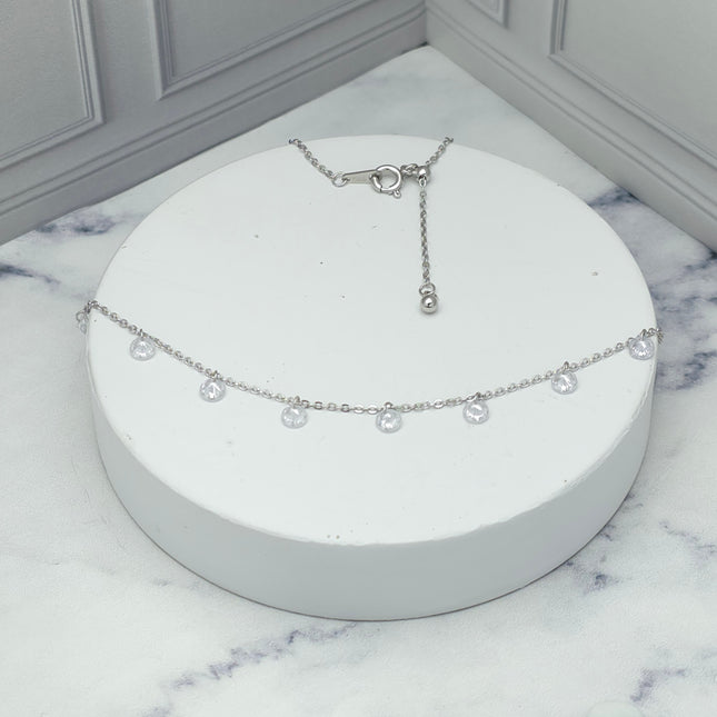 Collar de plata con dijes de circonia