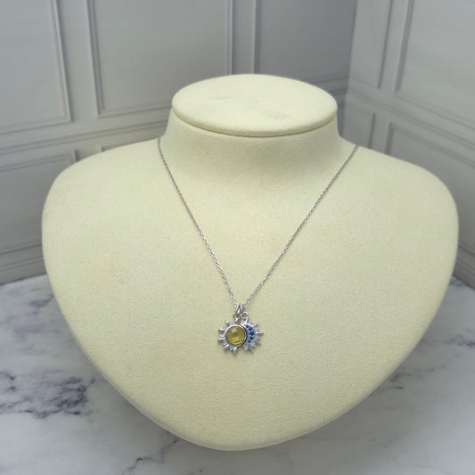 Collar de plata con sol y luna