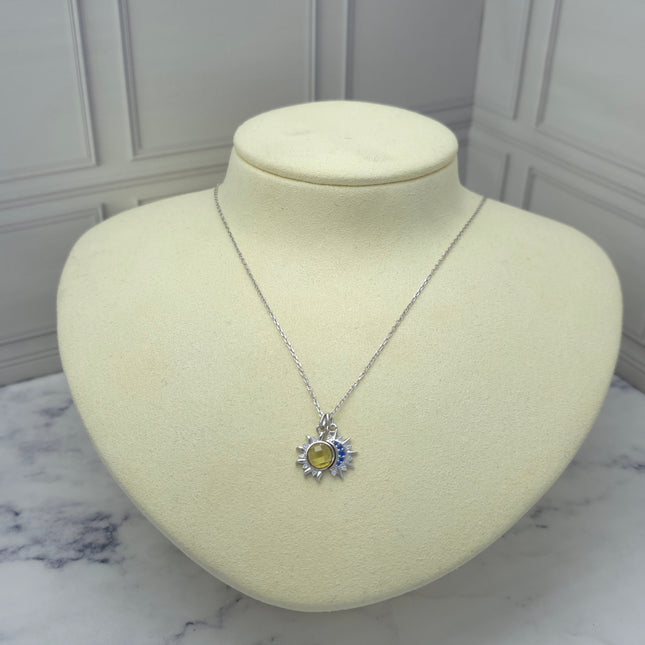 Collar de plata con sol y luna