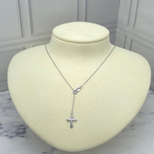Collar de plata con cruz y símbolo de infinito