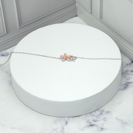 Pulsera de plata con flor rosada