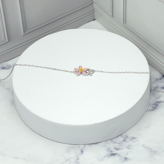 Pulsera de plata con flor rosada