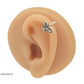 Arete con diseño de mariposa y circonias