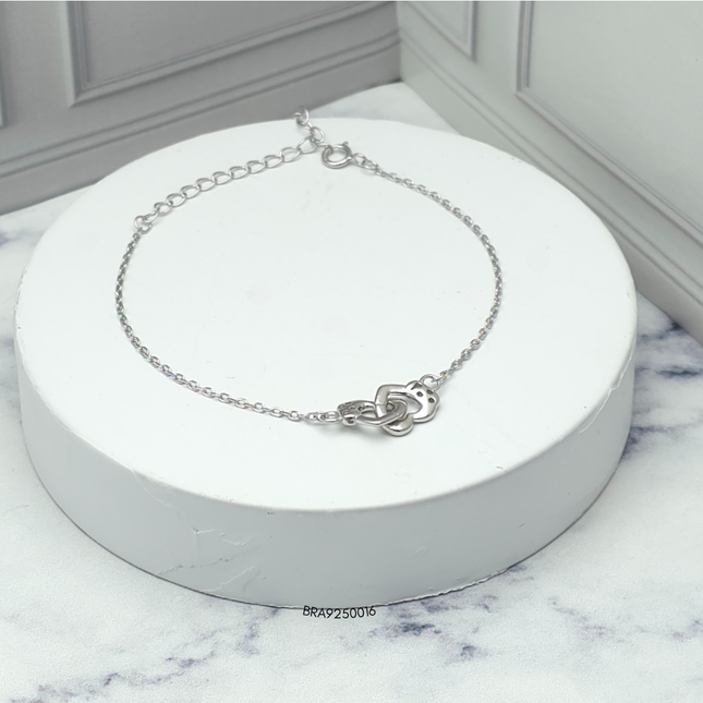 Pulsera de plata con corazones entrelazados